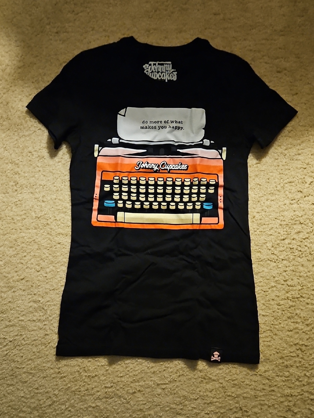 Johnny Cupcakes Black Tee with Orange and Cream Typewriter Print